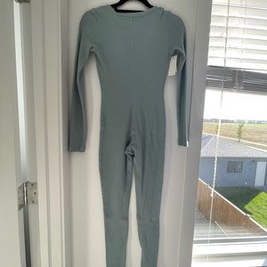 Teal Aritzia jumpsuit. Never worn with tags still on. Size XS